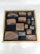 Collection of Fifteen vintage copper printing blocks to include images of guns, wheelbarrows,
