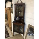 Corner display cabinet with inlay detailing, with two velvet lined glass-fronted cupboards and