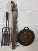 Metalware to include fireside implements and an iron flat weight with handle