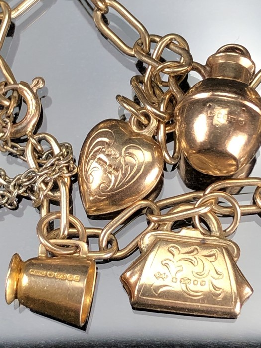 9ct Gold charm bracelet with seven gold charms (the boat marked for 14ct). total weight approx 12. - Image 5 of 5