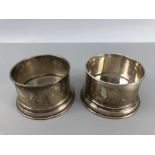 Pair of silver (marked 900 to base maker "AL") wine holders
