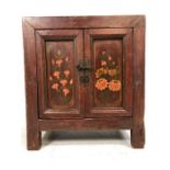 Small Asian wooden chest with floral design to doors approx 59cm x 36cm x 65cm tall