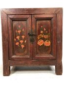 Small Asian wooden chest with floral design to doors approx 59cm x 36cm x 65cm tall