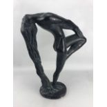 Ornamental figure of a nude lady with head thrown back and hair draping to the floor, the oval