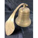 Vintage brass bell with wall bracket