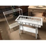 White towel rail and white wooden plant/pot stand