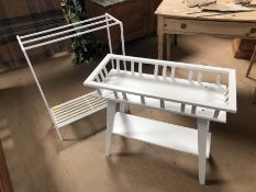 White towel rail and white wooden plant/pot stand