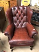 Red leather wing back Armchair A/F