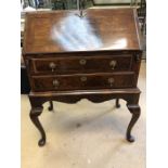 Antique bureau with two drawers and original key, approx 74cm x 48cm x 101cm tall