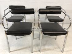 Set of four modern black and chrome office/dining chairs