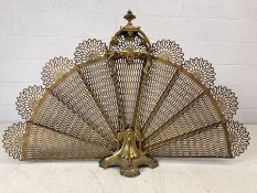 Victorian brass peacock fire screen with twisted snake detailing and ornate finial