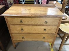 Small chest of three drawers with upstand, on castors, approx 92cm x 45cm x 80cm tall