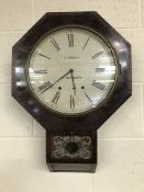 Hexagonal shaped wall clock with pendulum and key by E.Norman of Cheap Street, Sherborne