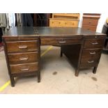 Extra large office desk with green leather top and seven drawers, approx 153cm x 90cm x 76cm tall