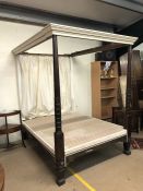 Four poster bed (5ft, king size) with turned wooden posts, cream painted top and cream back curtain