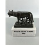 Bronze Sculpture of The Capitoline Wolf on a marble plinth with the inscription BOSTON LATIN