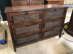 Modern dark wood six drawer chest with cane detailing to drawers, approx 123cm x 82cm x 48cm deep