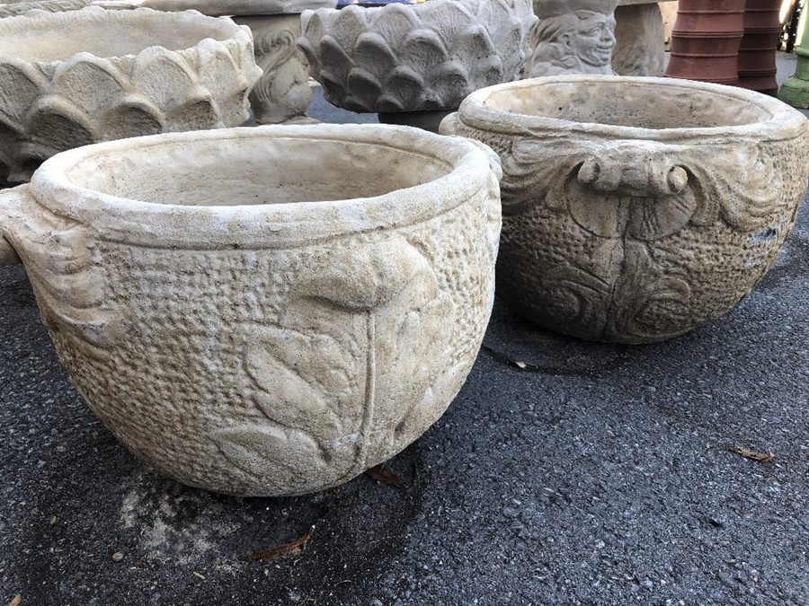 Pair of low stone garden urns