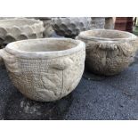 Pair of low stone garden urns