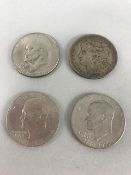 American coins: Three one dollar pluribus unum coins and a One Dollar coin dated 1890