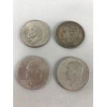 American coins: Three one dollar pluribus unum coins and a One Dollar coin dated 1890