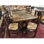 Refectory-style extending dining table with four ladder back, rush seated chairs. Table approx 206cm