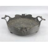 Interesting pewter tray on four ball feet in the arts and crafts style with two handles and