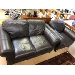 Brown leather two seater sofa and matching armchair