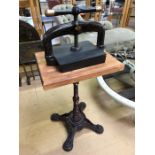 Antique cast iron book press, comes with improvised wrought iron stand