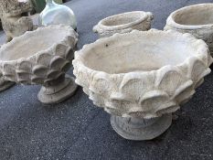 Pair of low stone garden urns