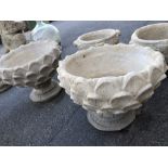 Pair of low stone garden urns