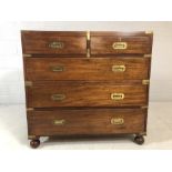 Campaign chest of five drawers with original brass fittings, approx 101cm x 44cm x 96cm