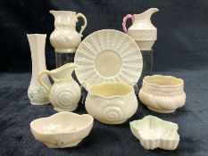 A small collection of Irish Belleek porcelain to include bud vase, two pin dishes, shell pattern