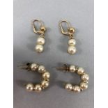 Two sets of pearl earrings on unmarked Gold