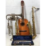 Collection of vintage musical instruments to include a Graduate boxed flute, a Lark trumpet, a