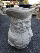 Stone planter in a Toby Jug design