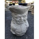 Stone planter in a Toby Jug design