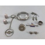 Collection of silver items to include Hallmarked bangle marcasite gecko brooch, hallmarked silver