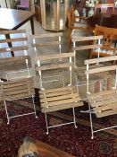 Set of six vintage folding garden chairs with slatted wooden seats and white metal frames