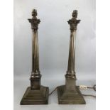 Pair of column style lamps on stepped bases approx 55cm tall