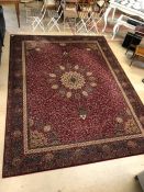 Large red ground wool carpet, approx 365cm x 276cm