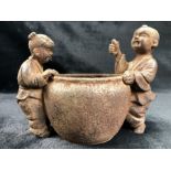 Bowl flanked by two Chinese figures, approx 21cm x 16cm
