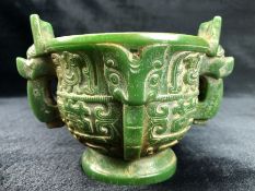 Chinese twin handled carved cup, jade in colour, approx 15cm x 11cm