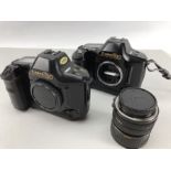 Two Canon T90 camera bodies and a canon zoom lens FD 35 - 70mm, 1: 3.5 - 4.5