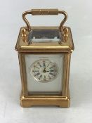 Miniature carriage clock, approx 17cm tall, with key