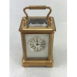 Miniature carriage clock, approx 17cm tall, with key