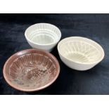 Collection of three ceramic jelly moulds, one with Brownfield makers mark to base