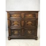 Jacobean chest of four drawers with applied carved mouldings and brass handles. Comes in two