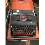 Vintage Olympia cased typewriter
