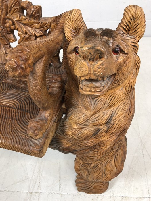 A Black forest style low bench, with two bears flanking a carved back and solid seat, approx 120cm x - Image 3 of 12